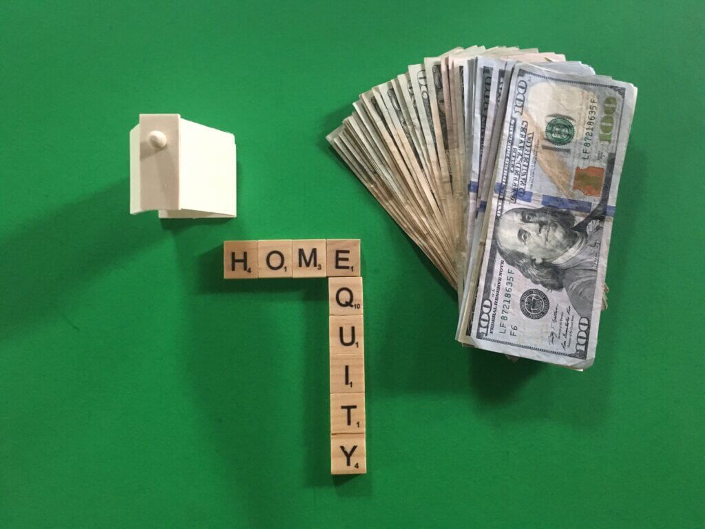 Home Equity words, money and small house