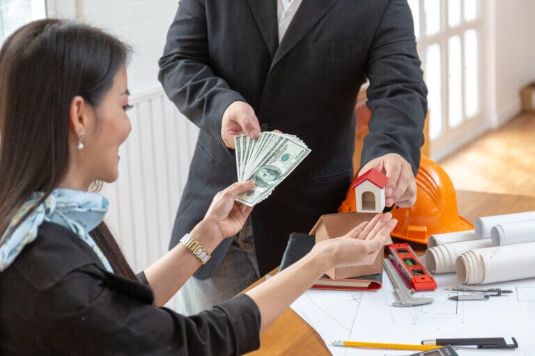 business-finance-housing-loan-close-up-hands-of-m-2025-10-28-21-48-10-utc